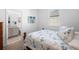 Inviting bedroom with a view of a beautifully appointed en-suite bathroom at 875 Honey Petal Ln, Deland, FL 32720