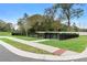 A fenced-in dog park featuring benches and multiple entry points at 875 Honey Petal Ln, Deland, FL 32720