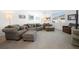 Spacious living room with ample seating and neutral decor at 875 Honey Petal Ln, Deland, FL 32720