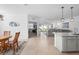 Open floor plan showcases seamless flow between kitchen, dining, and living areas at 875 Honey Petal Ln, Deland, FL 32720