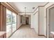 Bright dining room features tile floors and sliding glass doors, enhancing the space with natural light at 953 Pineapple Rd, South Daytona, FL 32119