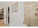 Bathroom with shower, with hallway and bedroom views at 971 Cascades Park Trl, Deland, FL 32720