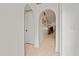 Hallway view featuring arched doorways leading to different areas of the home at 971 Cascades Park Trl, Deland, FL 32720