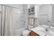 Clean bathroom featuring a shower-tub combo, a sink, and a toilet at 1318 Pup Fish Ln, Deland, FL 32724