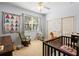 Cozy bedroom with natural light, neutral walls, and plush carpet at 1318 Pup Fish Ln, Deland, FL 32724