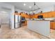 Bright kitchen featuring stainless steel appliances and a breakfast bar at 1318 Pup Fish Ln, Deland, FL 32724
