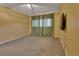 Bedroom features carpet flooring and a ceiling fan at 141 N Mcdonald Ave, Deland, FL 32724