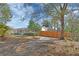 Well-maintained house with a large yard and wooden fence offering privacy at 141 N Mcdonald Ave, Deland, FL 32724