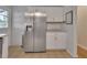 Bright kitchen featuring stainless steel appliances and white cabinetry at 141 N Mcdonald Ave, Deland, FL 32724