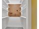 Organized storage space with pegboard and shelving at 141 N Mcdonald Ave, Deland, FL 32724