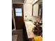 Cozy bathroom featuring a vanity with a sink and decorative mirror and fixtures at 1420 Felton St, Deltona, FL 32725