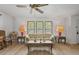 Traditional living room with hardwood floors and bright windows at 1420 Felton St, Deltona, FL 32725