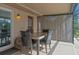 Inviting outdoor patio with dining set, perfect for entertaining at 1420 Felton St, Deltona, FL 32725