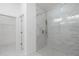 Modern bathroom featuring a large glass enclosed shower with marble tile at 1445 Enterprise Osteen Rd, Deltona, FL 32725