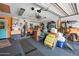 Spacious garage with storage and work area, with a variety of tools and supplies at 1489 Casey Ln, Port Orange, FL 32129