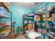 Organized storage room with shelving units and various containers, providing ample space at 1489 Casey Ln, Port Orange, FL 32129