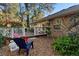 Backyard view with patio and outdoor seating at 1552 Covered Bridge Dr, Deland, FL 32724