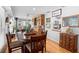 Cozy dining area featuring breakfast nook and hardwood flooring at 1552 Covered Bridge Dr, Deland, FL 32724