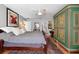 Comfortable main bedroom with neutral colors, ceiling fan, and hardwood floors at 1552 Covered Bridge Dr, Deland, FL 32724