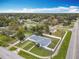 This home is an aerial shot with manicured lawn and an attached one car garage in a quiet neighborhood at 1579 Brady Dr, Deltona, FL 32725