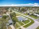 This home is an aerial shot with manicured lawn and an attached one car garage in a quiet neighborhood at 1579 Brady Dr, Deltona, FL 32725