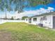 The backyard features a full fence and exterior entry door at 1579 Brady Dr, Deltona, FL 32725