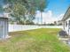 Large backyard surrounded by a privacy fence at 1579 Brady Dr, Deltona, FL 32725