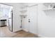 Functional laundry area connected to the kitchen, offering convenient storage solutions at 1579 Brady Dr, Deltona, FL 32725
