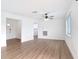 Open-concept living room features sleek wood-look floors and a bright, modern feel at 1579 Brady Dr, Deltona, FL 32725
