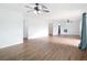 Bright living room features wood-look floors, and an open floorplan at 1579 Brady Dr, Deltona, FL 32725