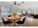 Inviting living space with wood floors, a dining area, and a view of the outdoors at 1579 Brady Dr, Deltona, FL 32725
