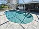The screened-in pool has a built-in spa and provides a private outdoor oasis at 1590 N Page Dr, Deltona, FL 32725