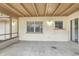 Cozy back patio with neutral paint, perfect for outdoor living at 1651 Kenlyn Dr, Longwood, FL 32779