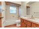 Cozy bathroom with tile, vanity, and combination shower and tub at 1651 Kenlyn Dr, Longwood, FL 32779