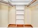 Walk-in closet with built-in shelves for optimal organization and storage at 1651 Kenlyn Dr, Longwood, FL 32779