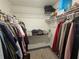 Walk-in closet with built-in shelving and organized storage solutions at 2235 Rabenton Rd, Deltona, FL 32738