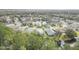 Stunning aerial shot of the community featuring homes surrounding a tranquil lake at 232 Gala Cir, Daytona Beach, FL 32124