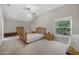 Bright bedroom with a vaulted ceiling and large window at 232 Gala Cir, Daytona Beach, FL 32124