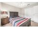 Comfortable bedroom with ceiling fan, closet, and warm lighting at 232 Gala Cir, Daytona Beach, FL 32124