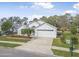 Attractive single-story home with attached garage and well-maintained lawn at 232 Gala Cir, Daytona Beach, FL 32124