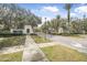 Scenic entrance to LPGA International community with manicured landscaping at 232 Gala Cir, Daytona Beach, FL 32124