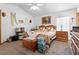 The main bedroom offers a ceiling fan and a colorful quilt on the bed at 239 Buena Vista St, Debary, FL 32713