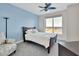This bedroom features a large window with water views, a bed, and a sitting chair at 241 Riverside Dr # 1502, Daytona Beach, FL 32117