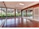 Elegant dance studio with wood floors, mirrors, and large windows, perfect for fitness and recreational activities at 241 Riverside Dr # 1502, Daytona Beach, FL 32117