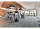 Bright gym features modern equipment, large windows, and scenic views, promoting a healthy lifestyle at 241 Riverside Dr # 1502, Daytona Beach, FL 32117
