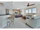 Stylish living room with comfortable seating, neutral decor, and water views at 241 Riverside Dr # 1502, Daytona Beach, FL 32117