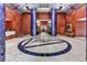 Elegant lobby with high ceilings, decorative columns, tile floors, and stylish decor at 241 Riverside Dr # 1502, Daytona Beach, FL 32117