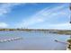 Expansive waterfront views featuring a bridge and cityscape under a partly cloudy sky at 241 Riverside Dr # 1502, Daytona Beach, FL 32117