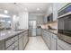 Well-equipped kitchen features stainless steel appliances and ample counter space at 291 Northcote Ct, Deland, FL 32724