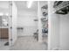 Large walk-in closet with built-in shelving and storage at 291 Northcote Ct, Deland, FL 32724